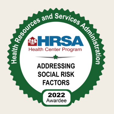 HRSA Addressing Social Risk Factors badge